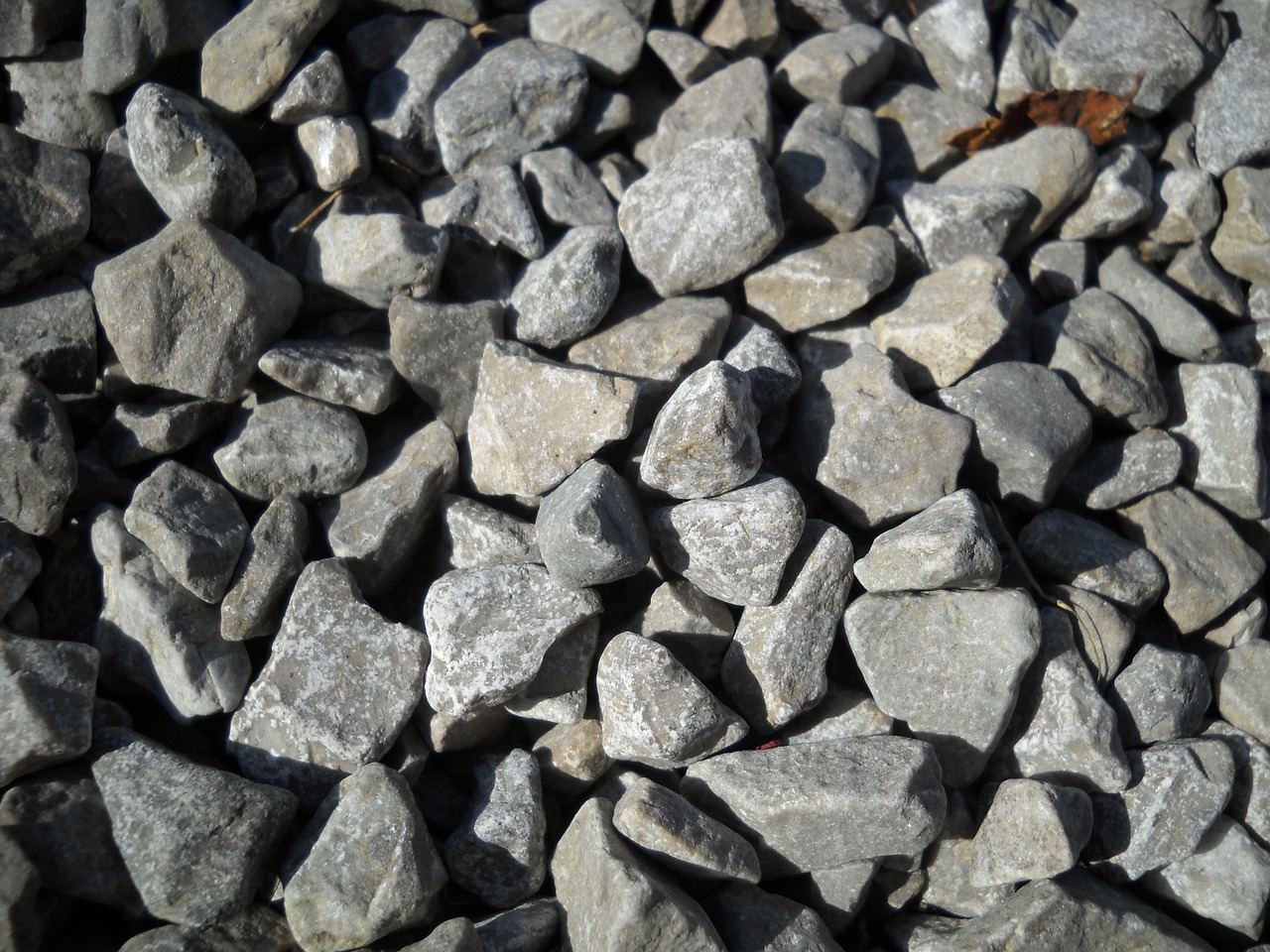 a pile of rocks sitting next to each other, a macro photograph, wallpaper!, stone roads, illinois, grain”