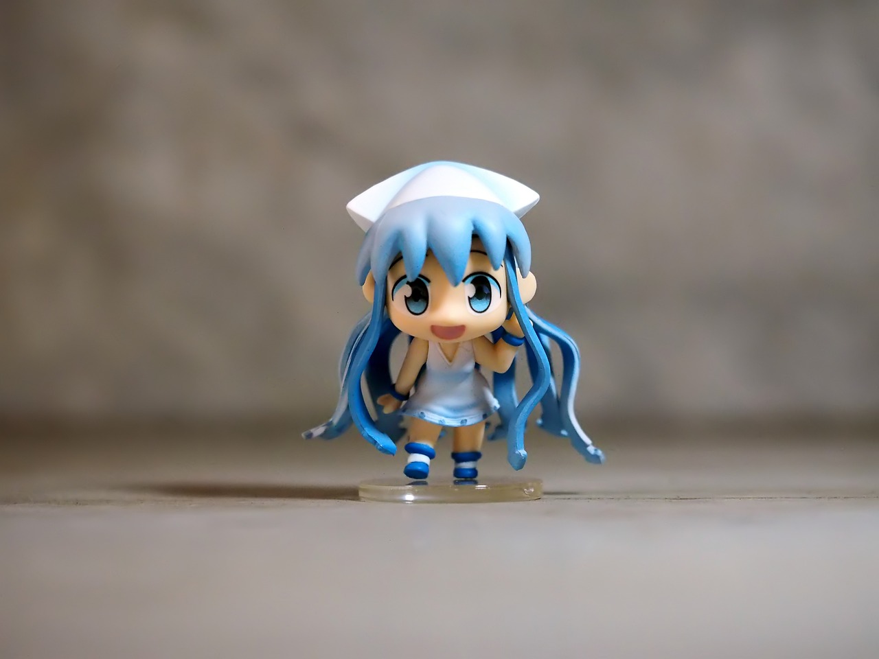 a close up of a toy figure on a table, pixiv, figuration libre, lucky star, white cyan, miniature product photo, nurse