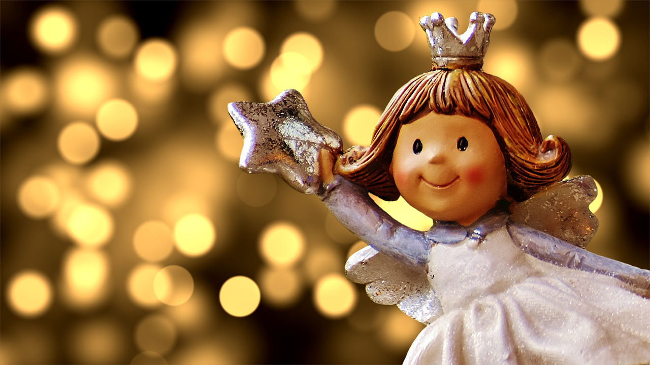 a figurine of a little girl holding a star, by Marie Angel, pixabay contest winner, smiling as a queen of fairies, good lighted photo, istockphoto, bottom angle