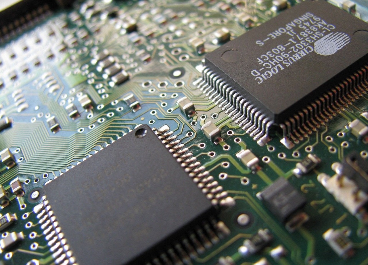 a close up of a circuit board with electronic components, a picture, by Dan Christensen, cpu gpu wafer, dcim, brocade, beginner