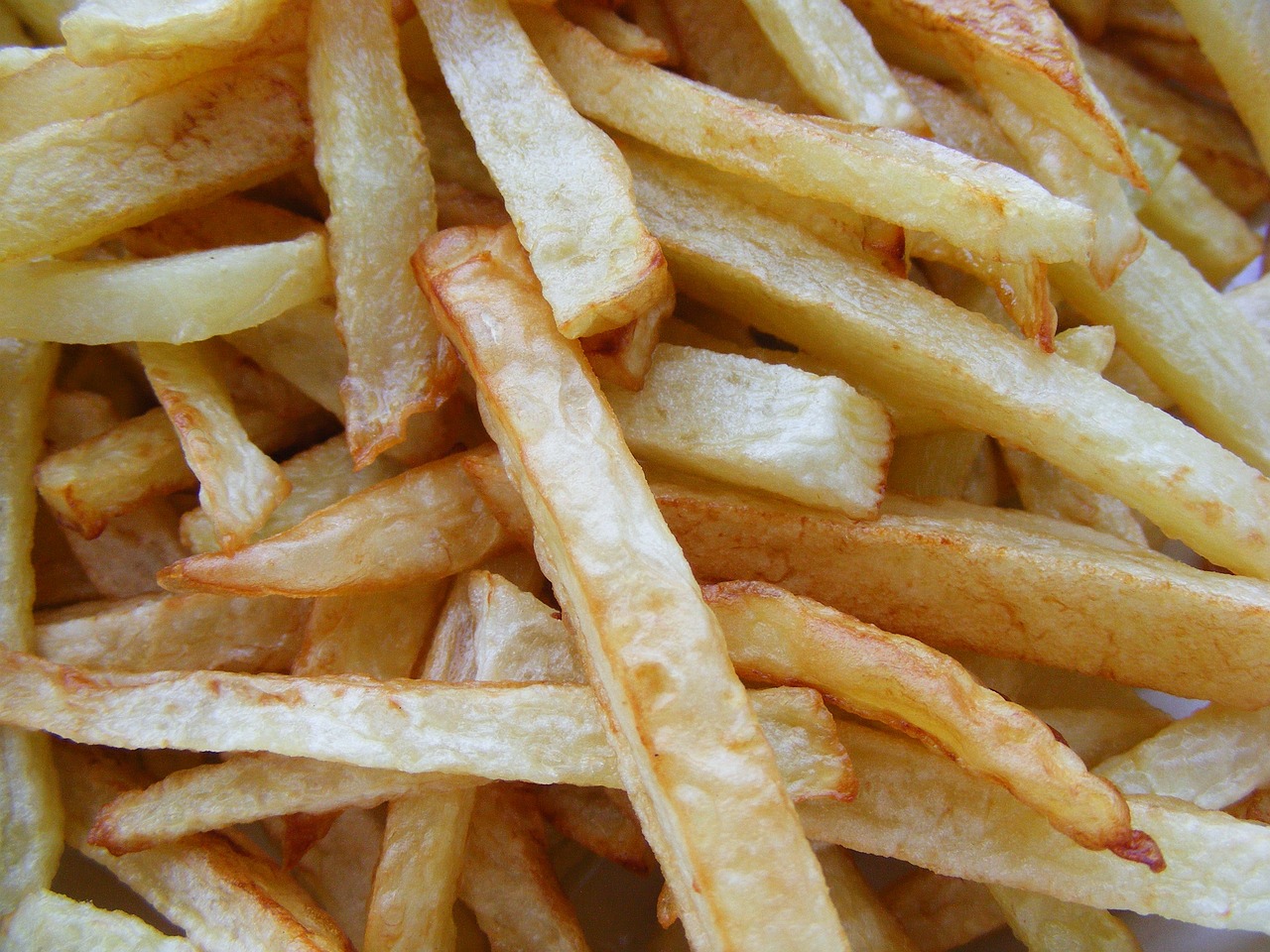 a close up of a pile of french fries, renaissance, annie leibowit, ultra texture, 4 0 9 6, cuisine