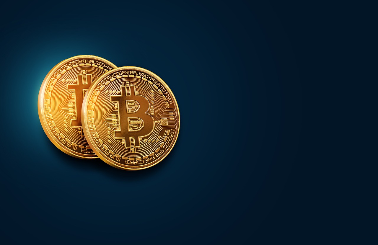 two gold bitcoins on a blue background, a digital rendering, baroque, above side view, shining golden hour, high detail product photo