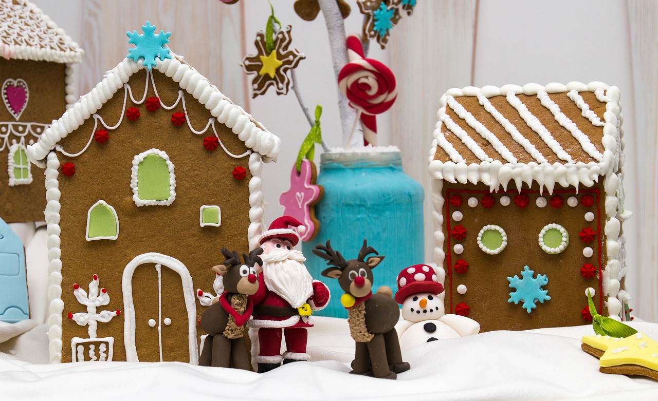 a group of gingerbread houses sitting on top of a table, a picture, inspired by Rudolph F. Ingerle, shutterstock, 3 d clay figure, detailed wide shot, product introduction photo, 3 4 5 3 1