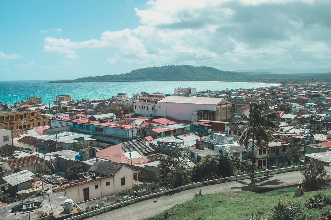 a view of a town next to the ocean, happening, pacal votan, town background, full res, sifi