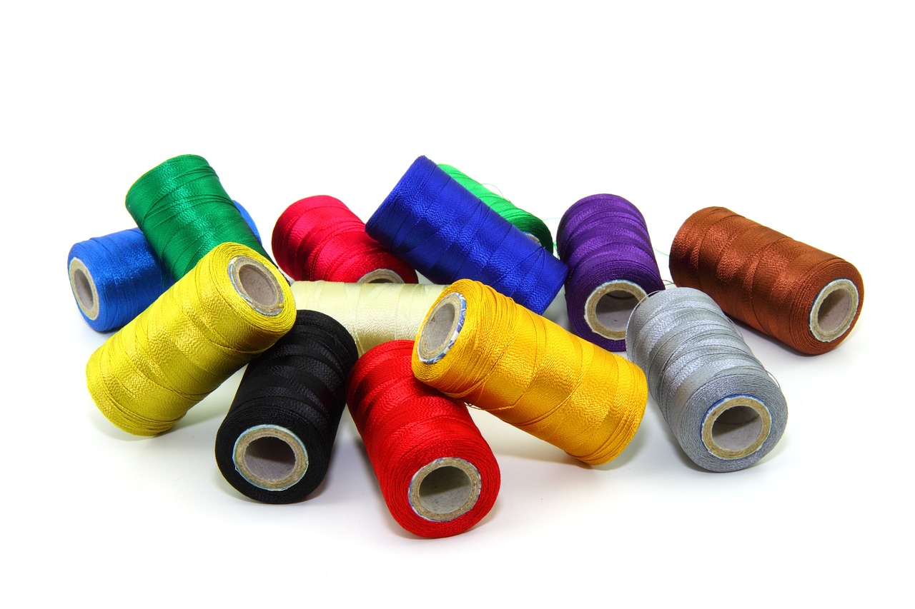 a bunch of spools of thread on a white surface, a picture, pixabay, renaissance, full of colour 8-w 1024, zig zag, wax, product photo