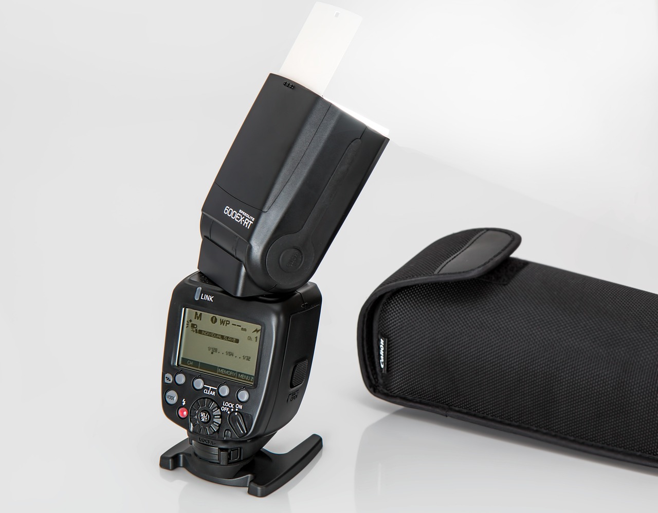 a flash camera sitting on top of a black case, softbox key light, h 640, product introduction photo, iso 800