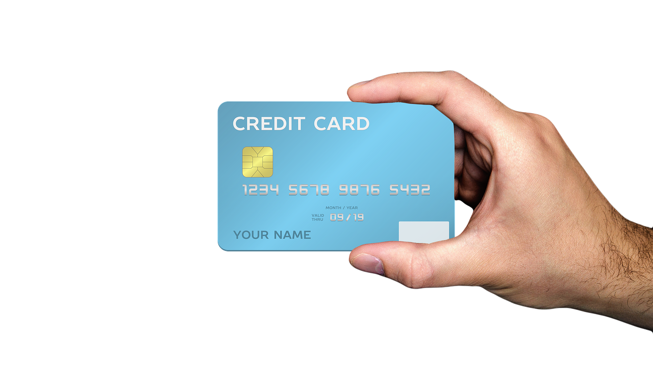 a person holding a credit card in their hand, by Maximilian Cercha, on black background, highly detailed product photo