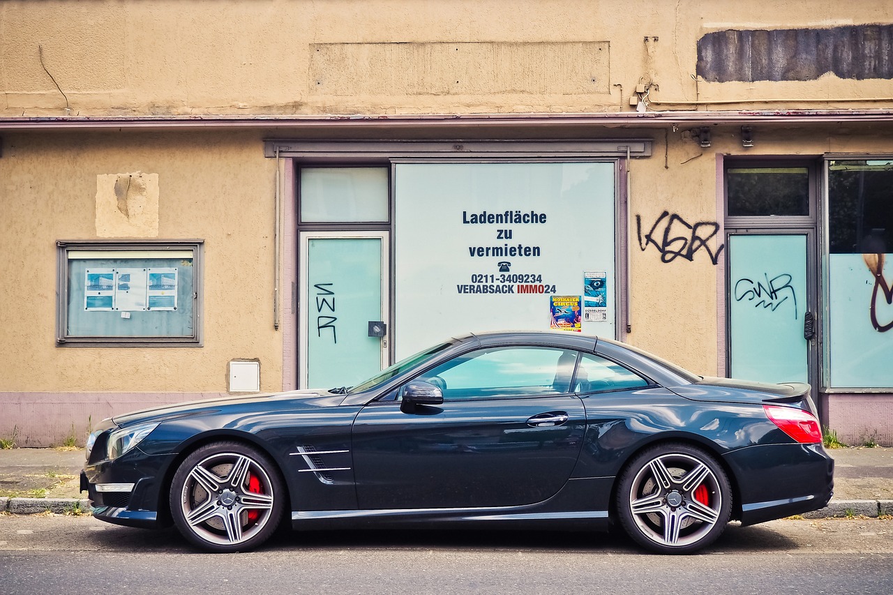 a black sports car parked in front of a building, a picture, by Matthias Weischer, wallpaper!, mercedez benz, rotated left right front back, contrasting colors