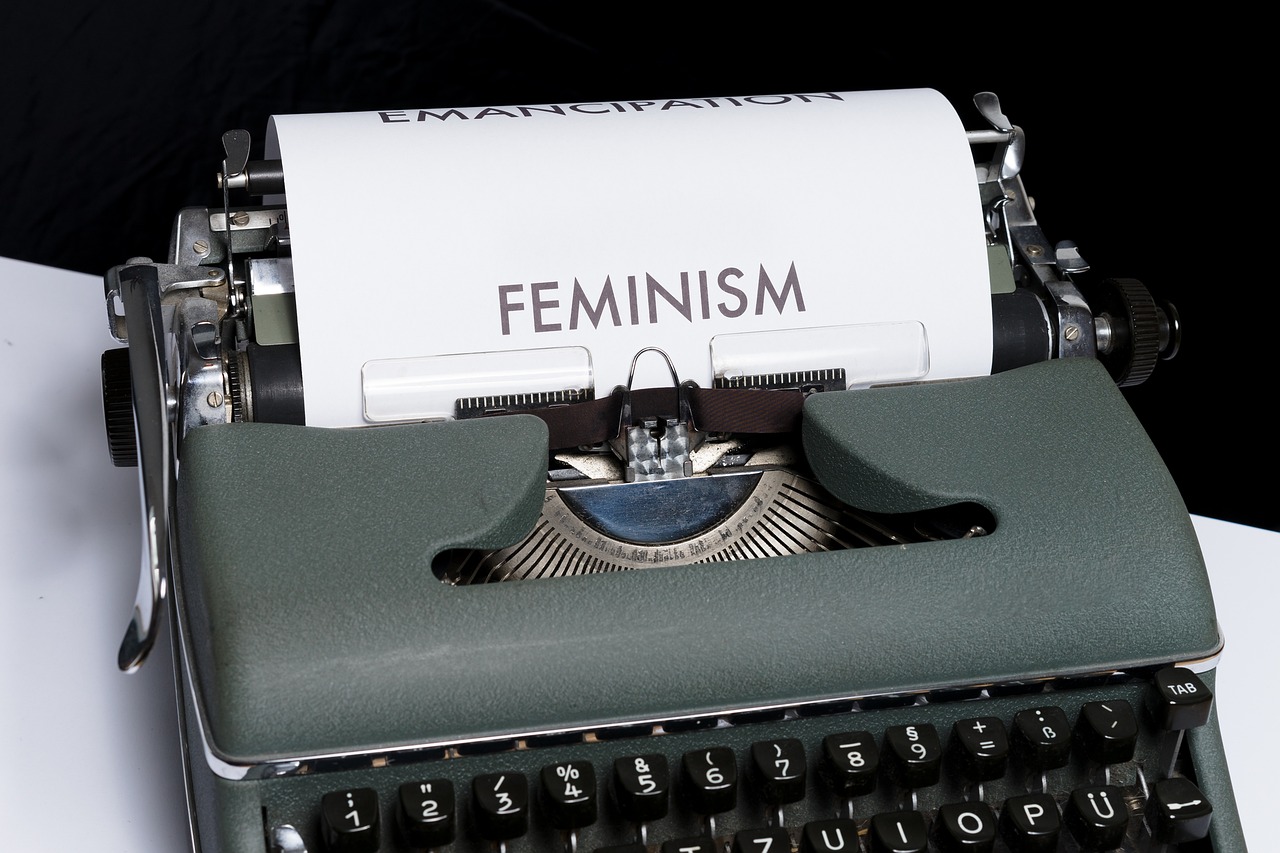 a close up of a typewriter with a paper on it, a stock photo, feminist art, feminism in the 24th century, 2 0 2 2 photo, concept, demigod