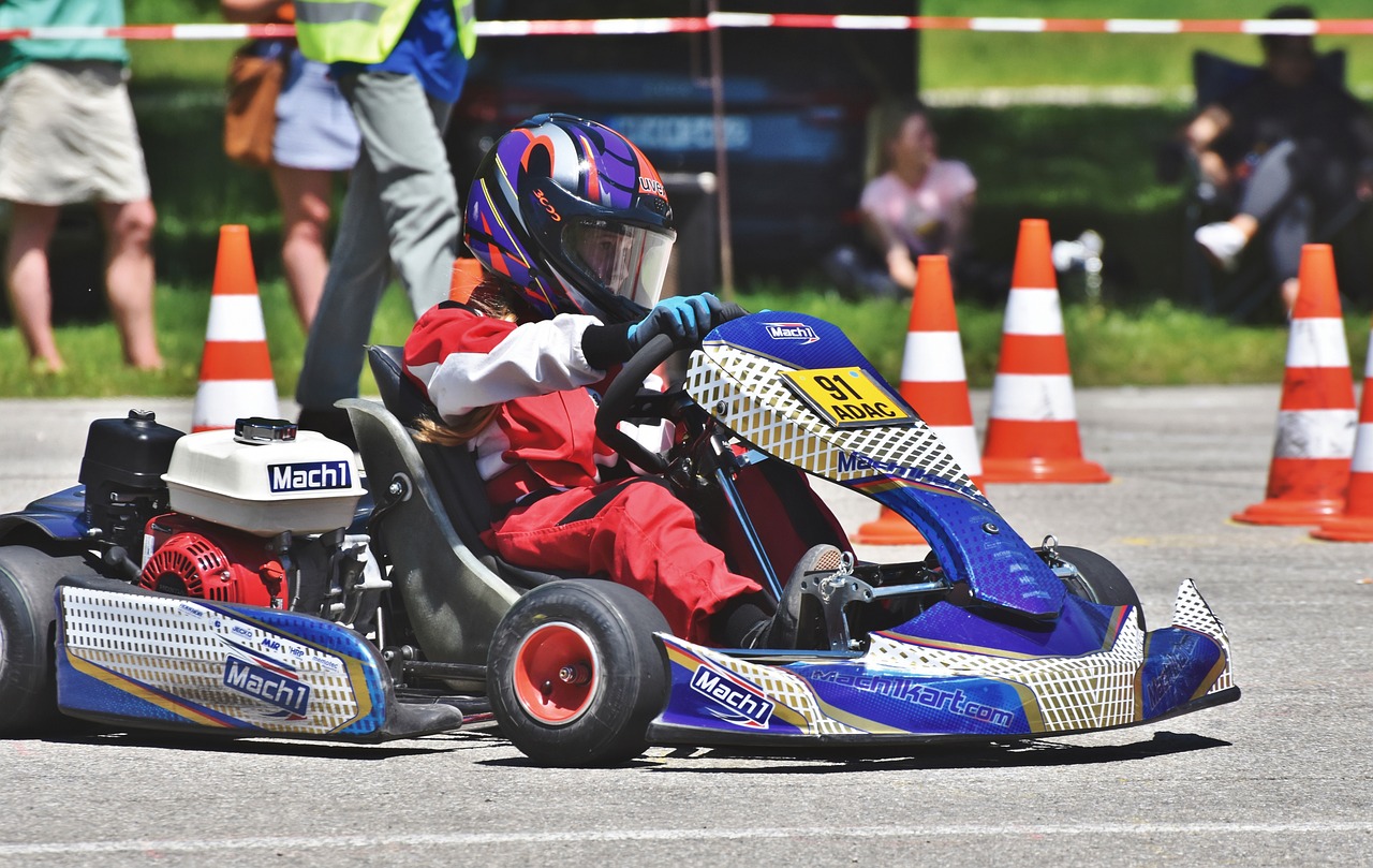 a person riding a go kart in a race, a picture, by Francesco Raibolini, shutterstock, children, 2 0 2 2 photo, reportage photo, maximum detail
