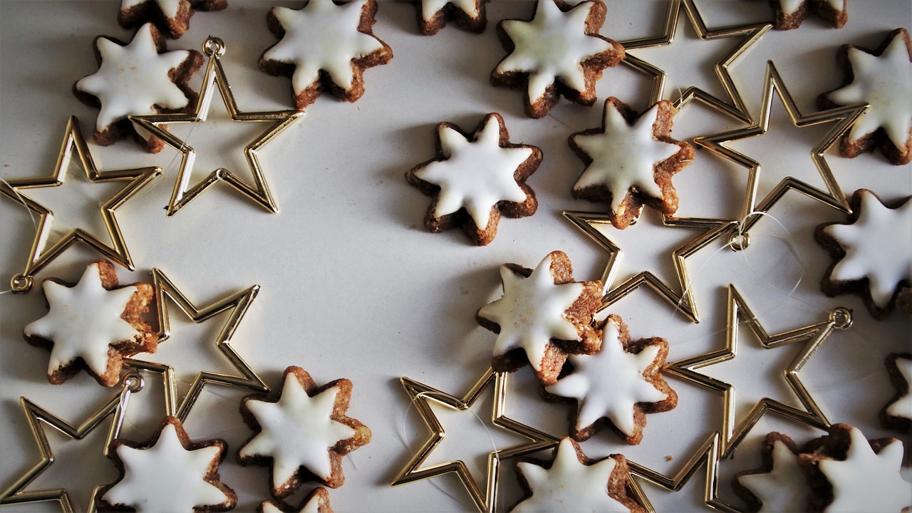 a bunch of star shaped cookies sitting on top of a table, a picture, by Sylvia Wishart, tumblr, white marble and gold, enamel, nordic, piping
