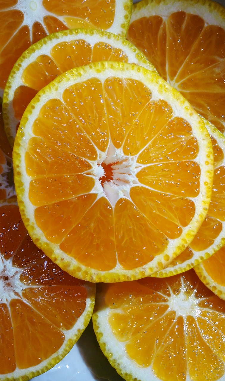 a pile of orange slices sitting on top of a white plate, a macro photograph, pexels, hurufiyya, glowing inside, rich bright sunny colors, transparent background, lemon demon