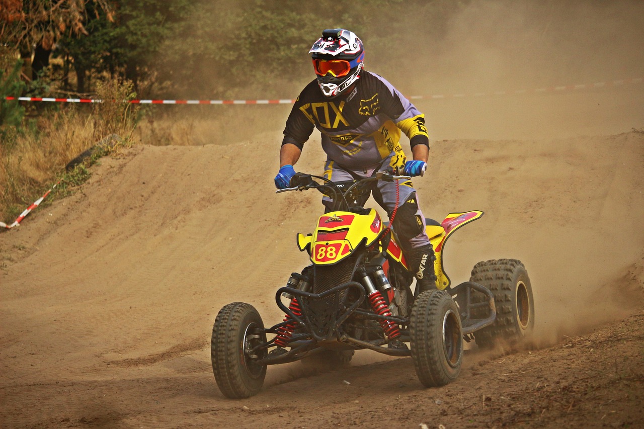 a man riding on the back of a yellow dirt bike, all terrain vehicle race, dlsr photo, avatar image, custom