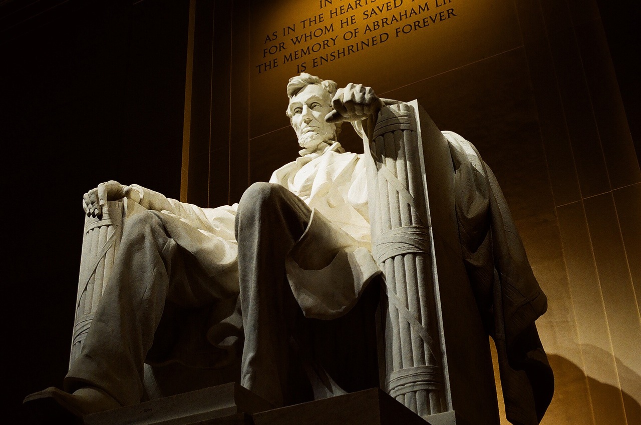 a statue of abraham lincoln at the lincoln memorial, by Scott M. Fischer, pixabay, resting on his throne, photo taken at night, motivational, snapchat photo
