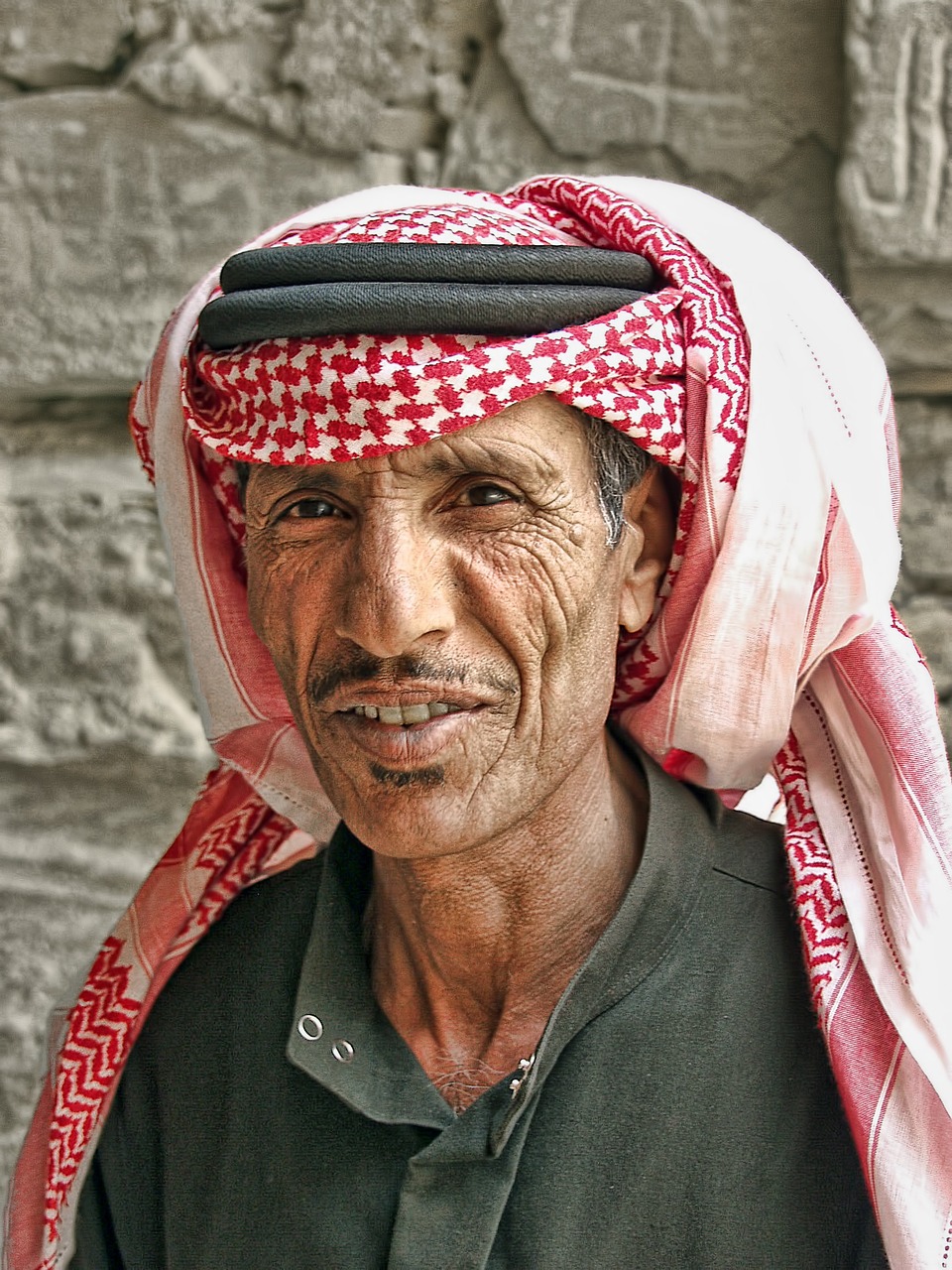 a close up of a person wearing a headscarf, a portrait, by Scott M. Fischer, flickr, dau-al-set, arab man, portrait of a old, some people around ”, stone face