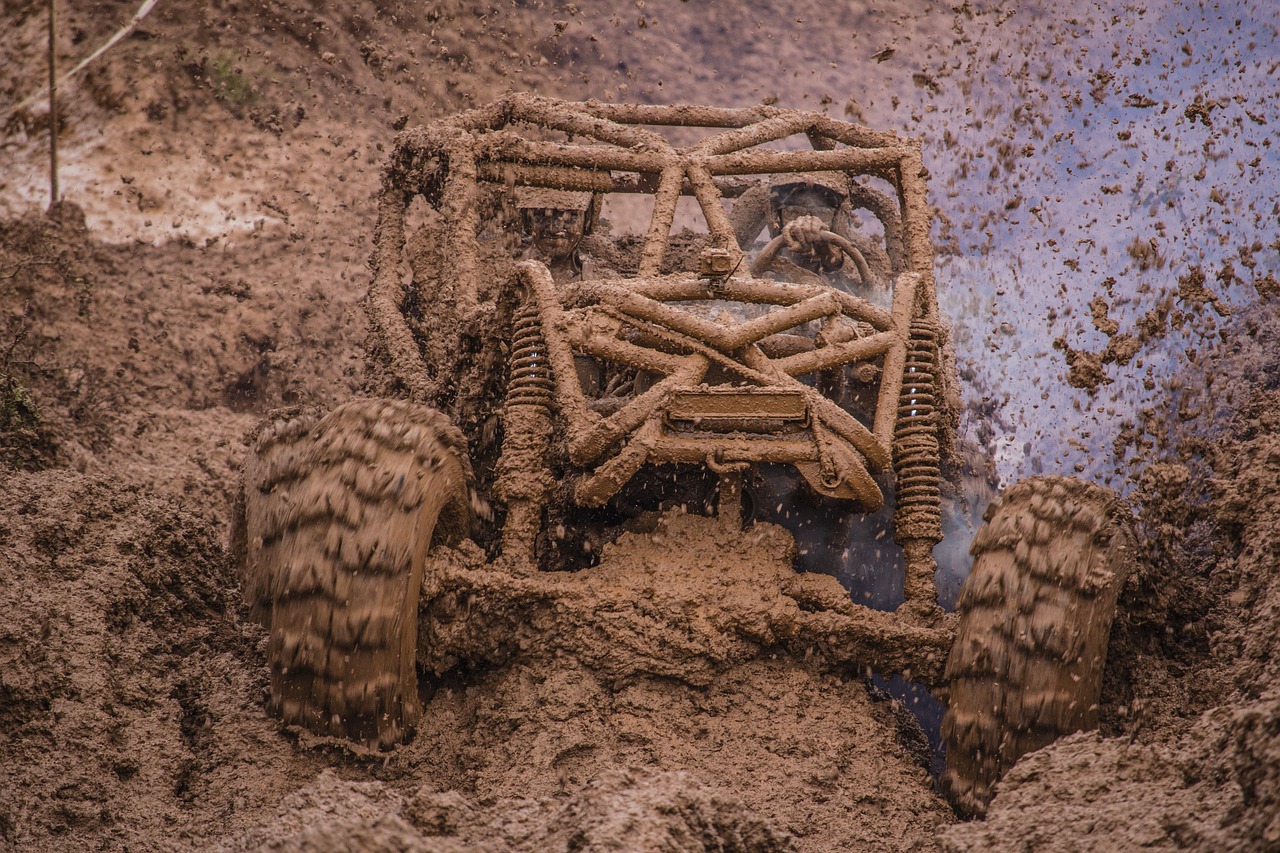 an off - road vehicle is stuck in the mud, a portrait, by Richard Carline, process art, buggy, ultra quality, foam, 1500