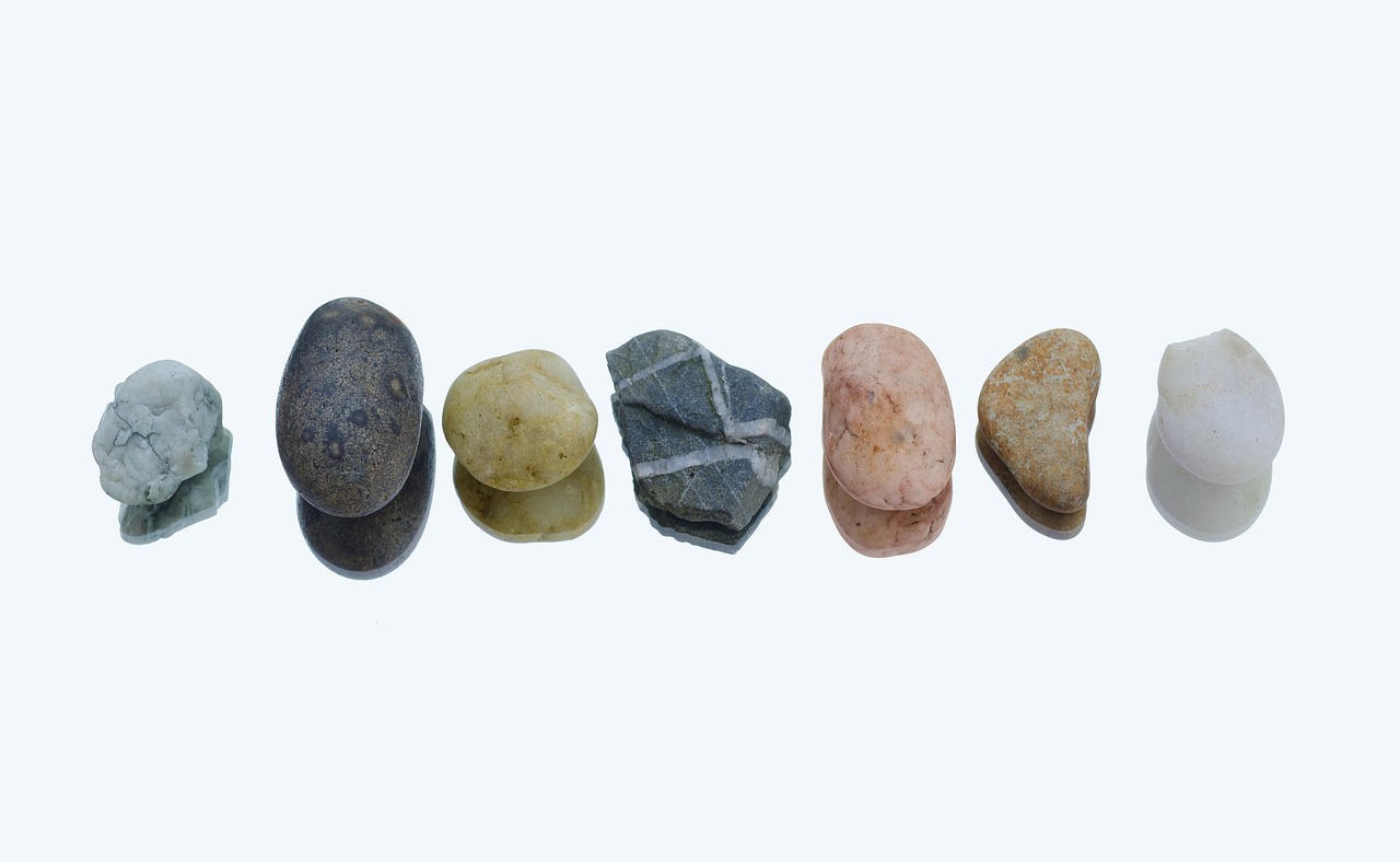 a group of rocks sitting next to each other, professional product photo, 5 mm, five-dimensional, product photo