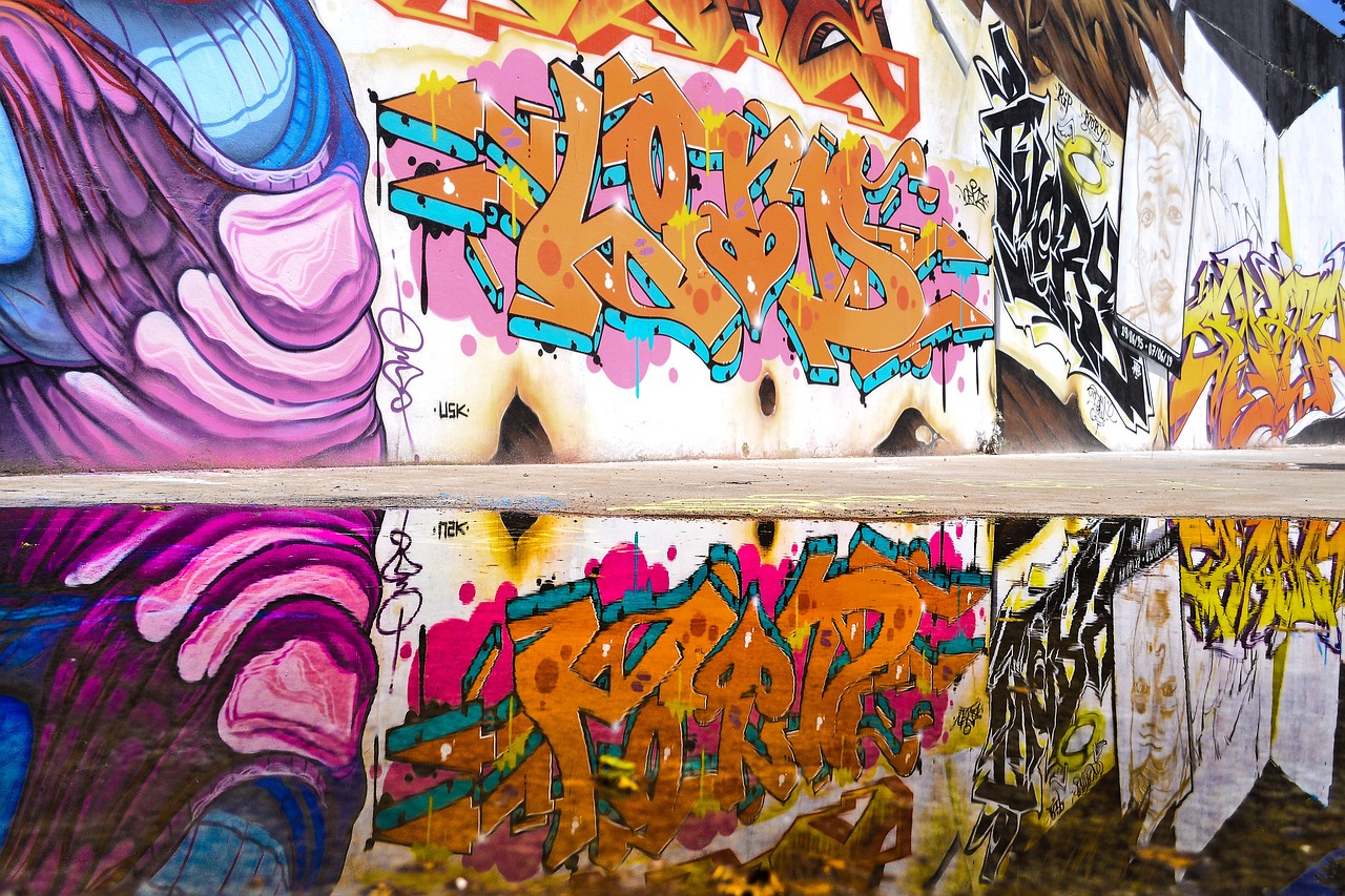 a man standing in front of a wall covered in graffiti, graffiti art, by Bascove, shutterstock, on a reflective gold plate, highly detail wide angle photo, waterline refractions, marble!! (eos 5ds r