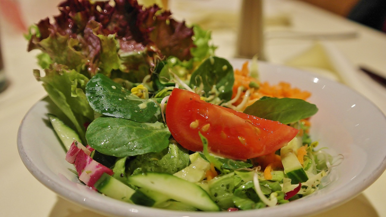 a close up of a bowl of food on a table, salad, wikimedia commons, avatar image, 👰 🏇 ❌ 🍃