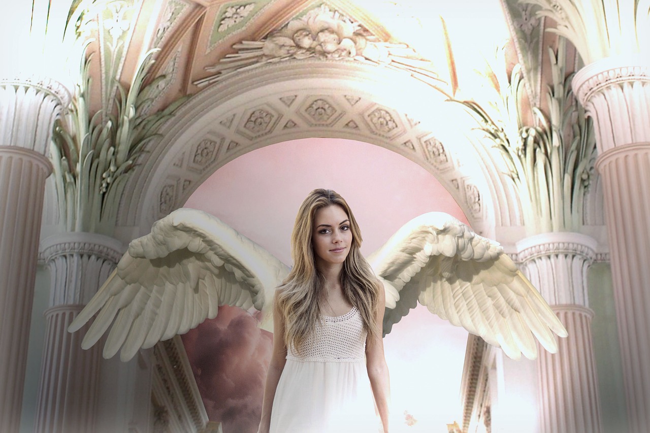 a woman in a white dress with angel wings, a colorized photo, by Marie Angel, pixabay contest winner, natalie dormer, shakira, inside her temple, sydney sweeney