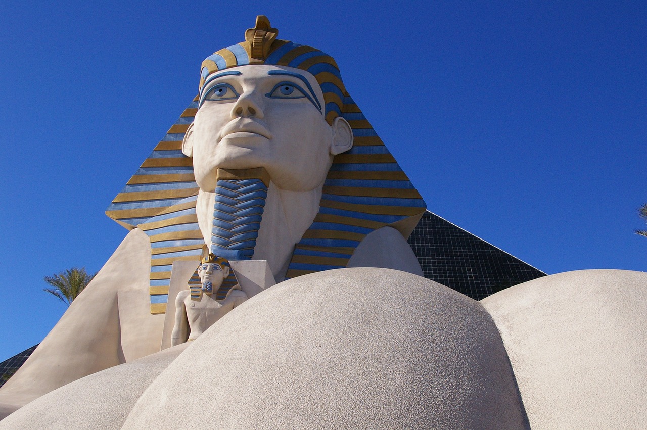 a large statue of a pharaoh in front of a building, by Dennis Ashbaugh, flickr, in las vegas, the sphinx, hypnos, above side view