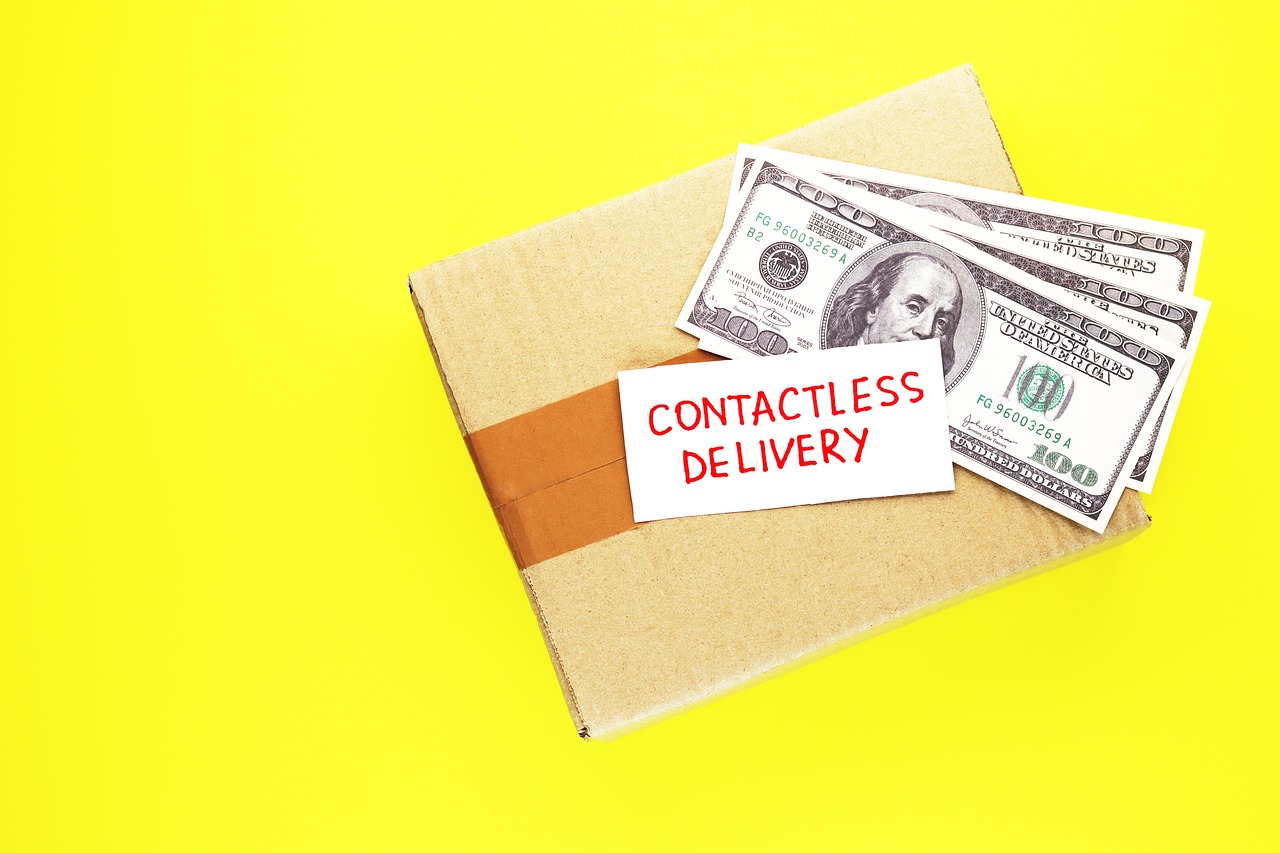 a package of cash sitting on top of a yellow surface, a stock photo, contourless, a labeled, delivering mail, high detail product photo