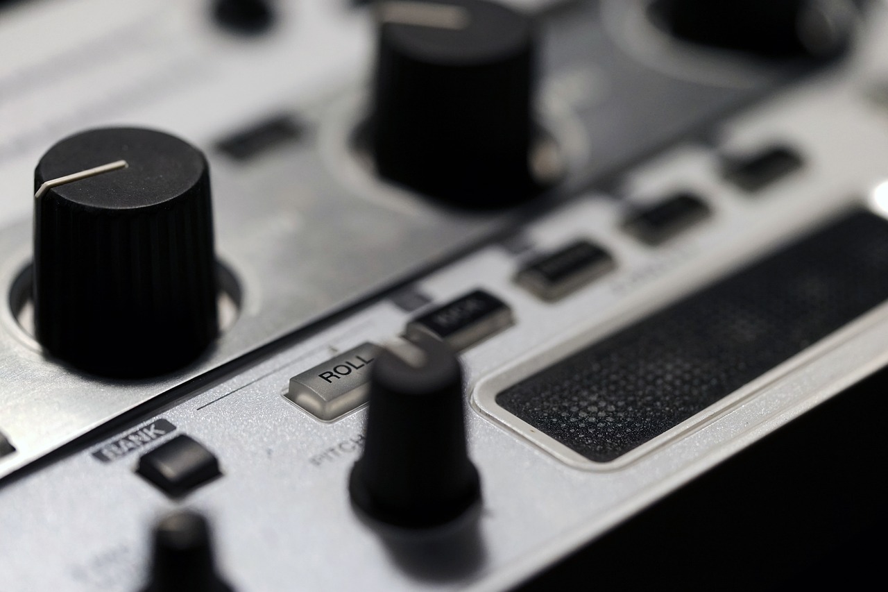 a close up of the knobs on a mixer, digital art, by Steven Belledin, unsplash, black and silver, controller, banner, white and black color palette
