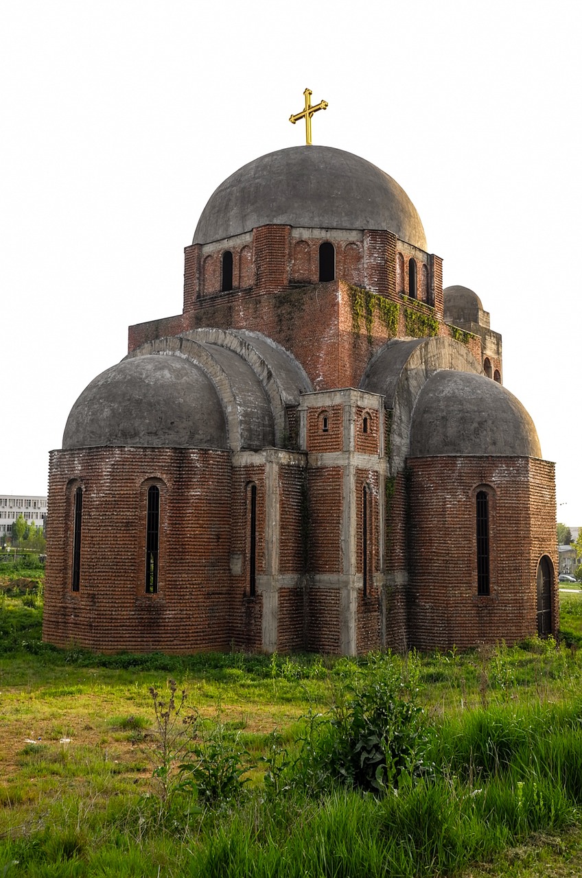 a large brick building with a cross on top of it, by Alexander Fedosav, romanesque, hexadome, abandoned structures, in orthodox church, side view from afar