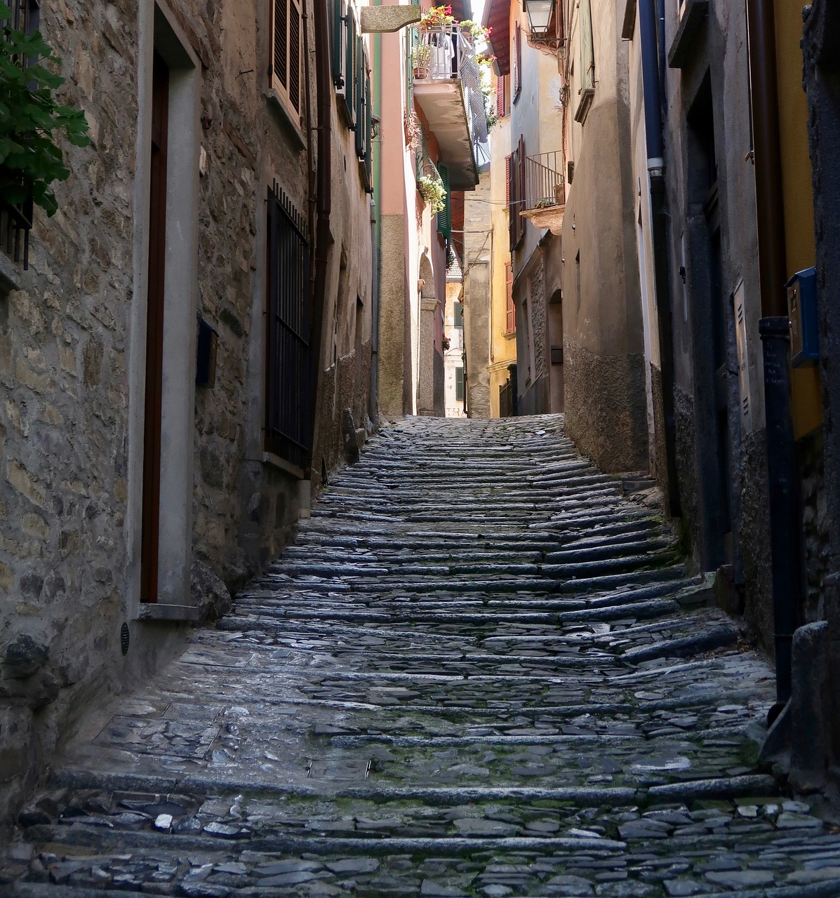 a narrow cobblestone street in an old town, by Alessandro Galli Bibiena, shutterstock, stairway to heaven, random detail, documentary still, bizzaro