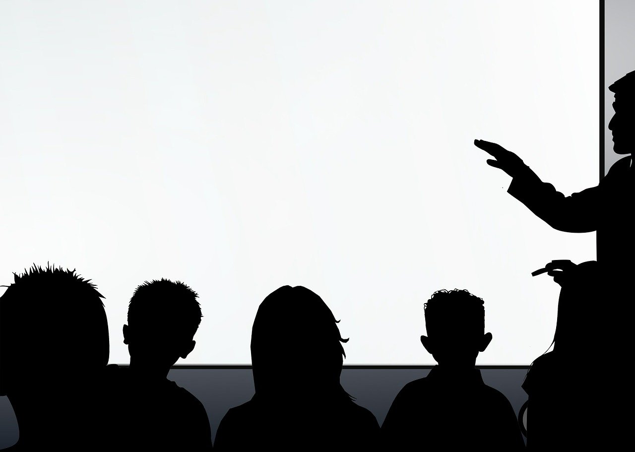 a man giving a presentation to a group of people, an illustration of, conceptual art, cinematic contrast, silhouetted, gettyimages, plain background