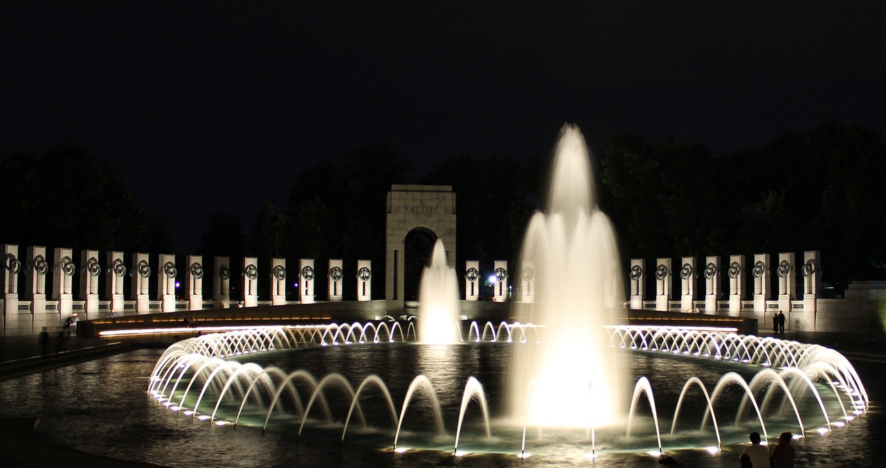 the world war ii memorial is lit up at night, by Cherryl Fountain, flickr, hurufiyya, magical scene, archs, discovered photo, 2 0 1 0 photo