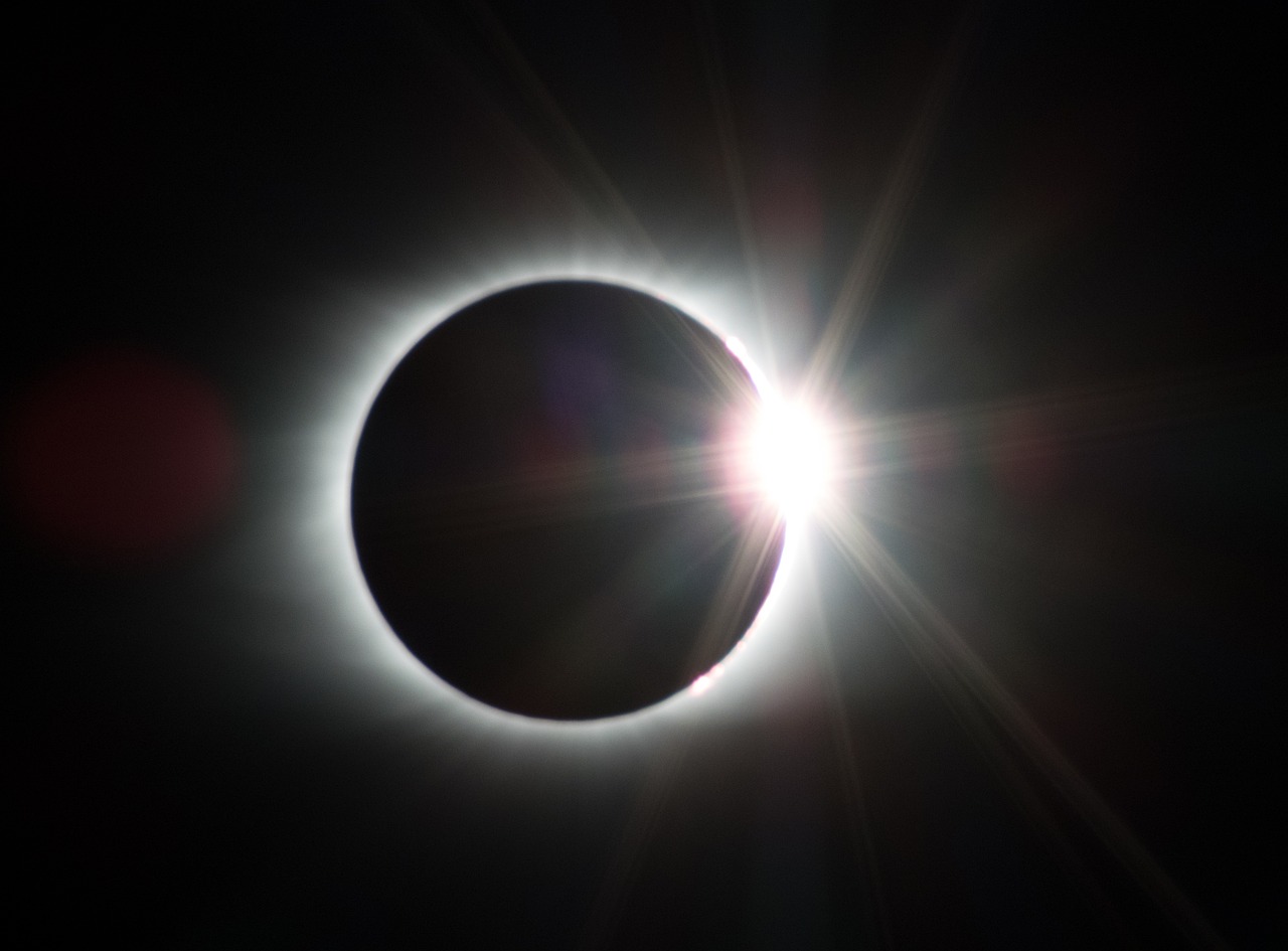a close up of the sun during a solar eclipse, a picture, by Tadashi Nakayama, pexels contest winner, hurufiyya, magic ring with a diamond, wikimedia commons, moonwalker photo, shot from below