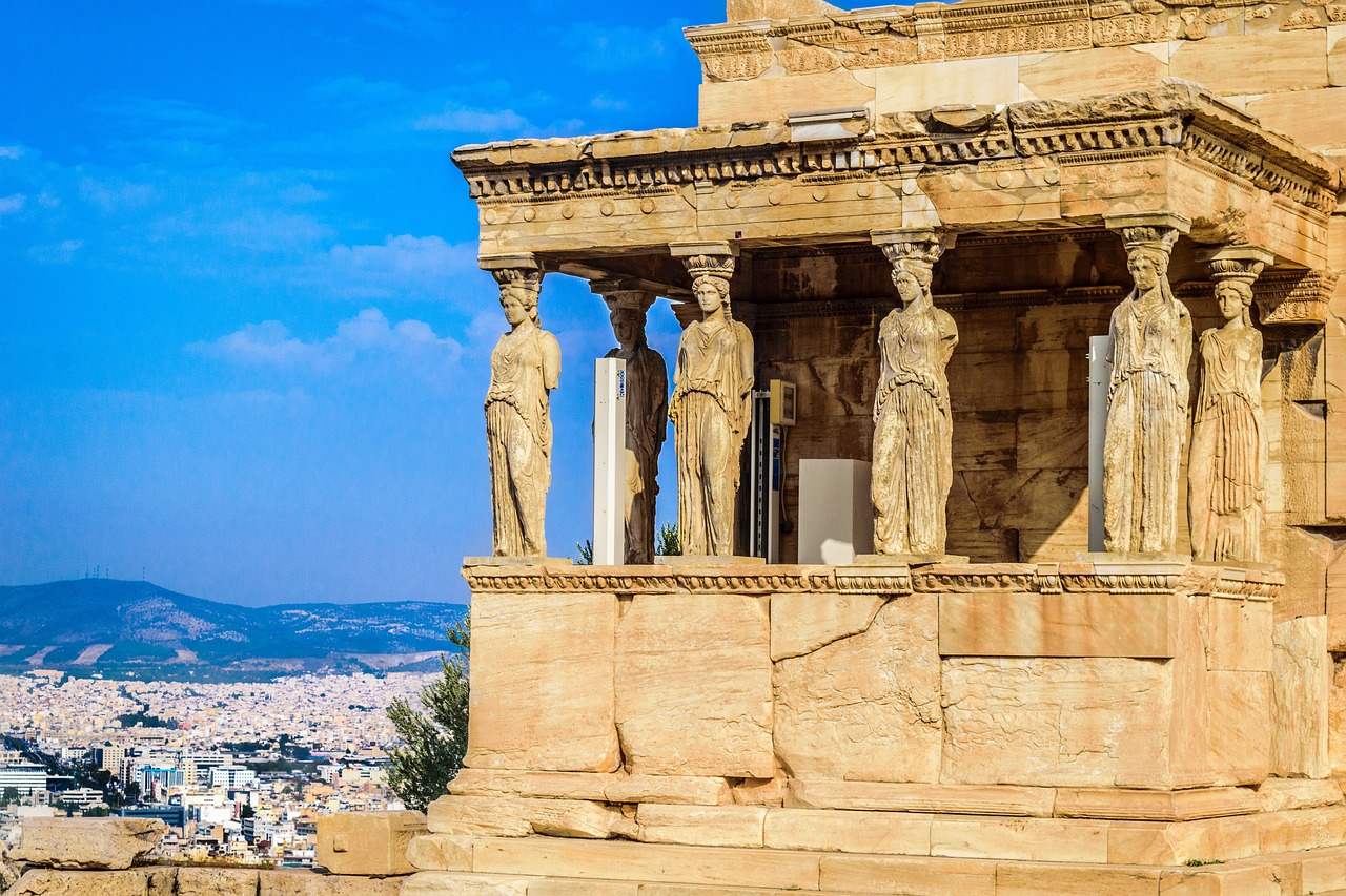 a group of statues sitting on top of a building, pexels contest winner, neoclassicism, at ancinet agora of athens, stunning view, on a pedestal, godrays from the right