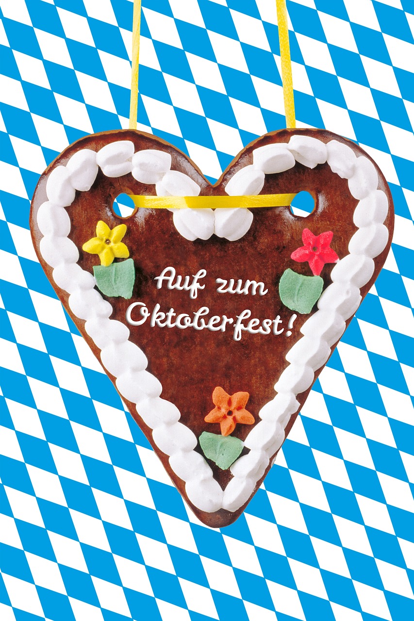 a heart shaped cake sitting on top of a blue and white checkered table cloth, a picture, by Otto Abt, shutterstock, graffiti, large octoberfest invite card, miniature product photo, fun - w 704, gingerbread people