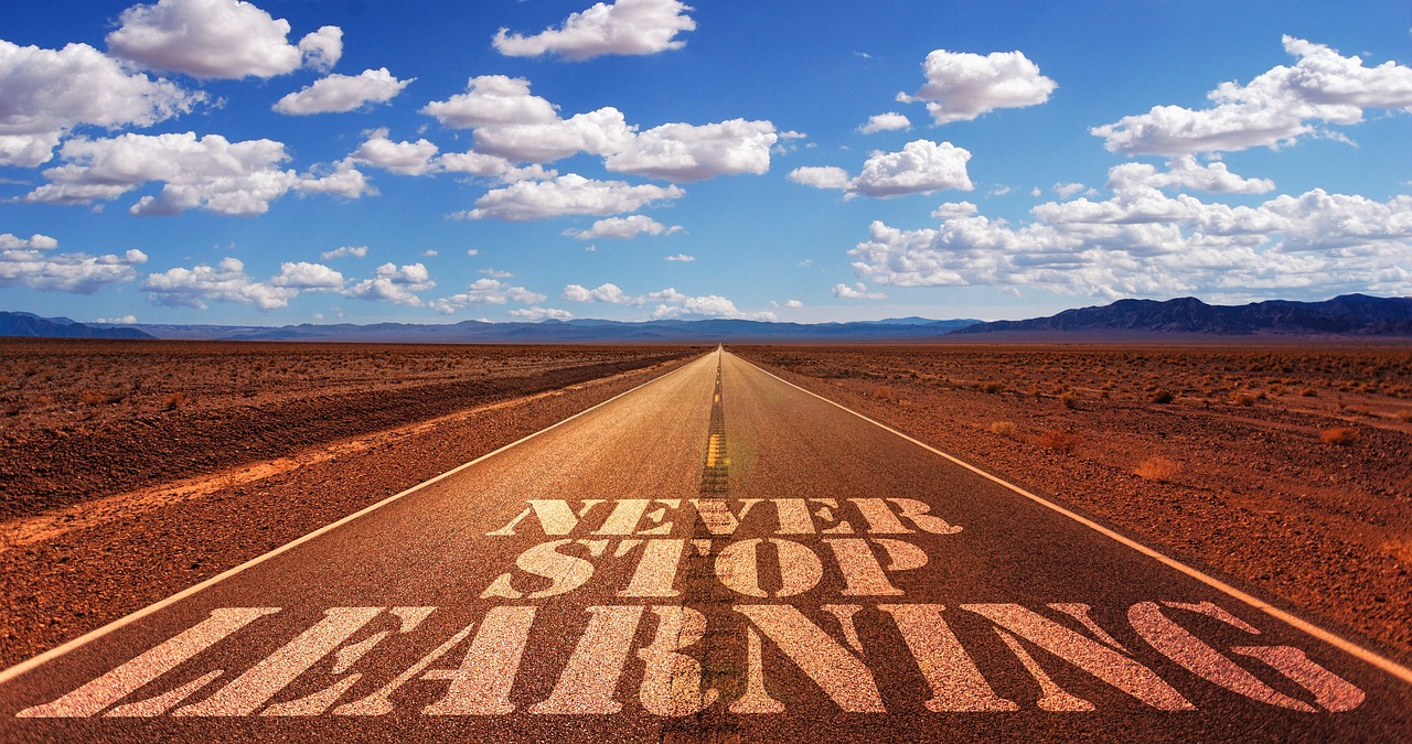 a road with the words never stop learning written on it, a picture, by Joseph-Marie Vien, shutterstock, hyperrealist highly intricate, wide angle landscape photography, stop - motion, desert highway