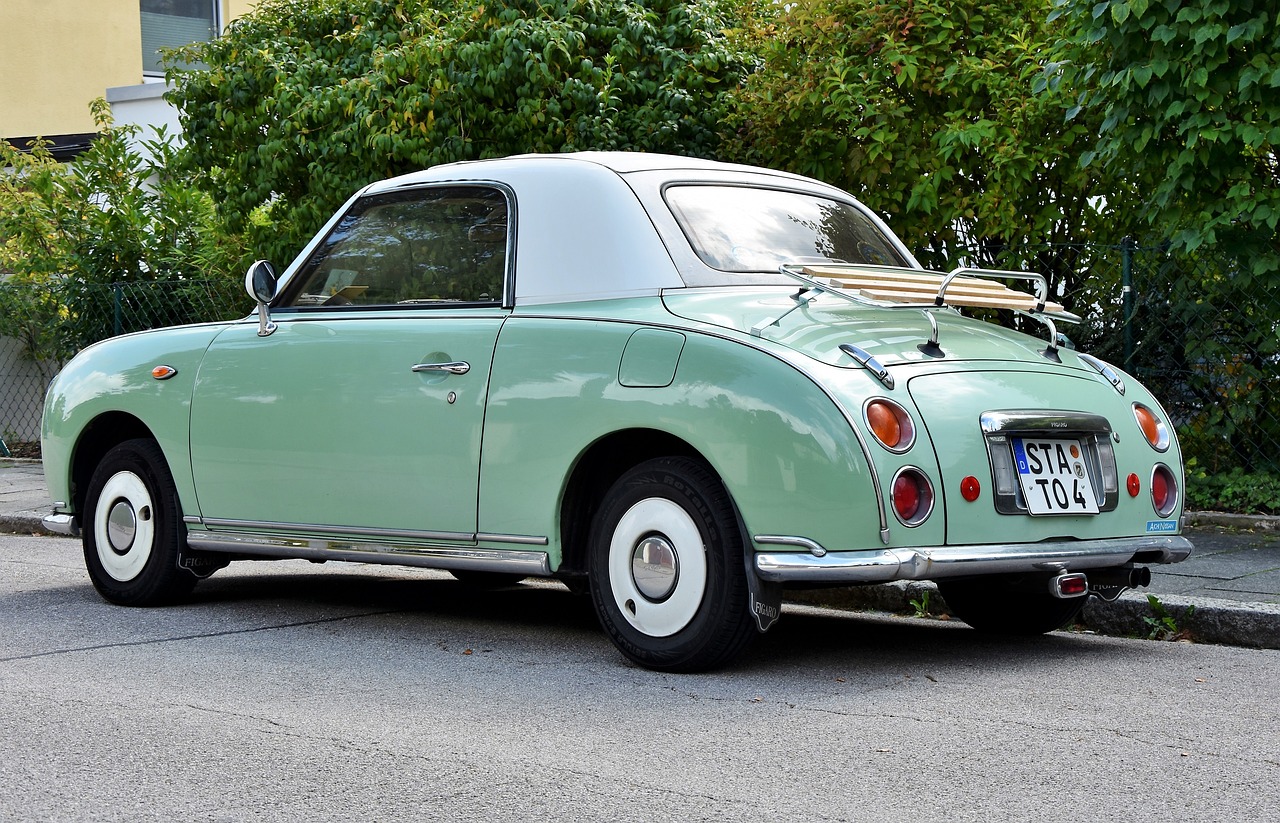 a green car parked on the side of the road, a pastel, shutterstock, mingei, soft top roof raised, symetrical japanese pearl, 50s style, photo taken from behind