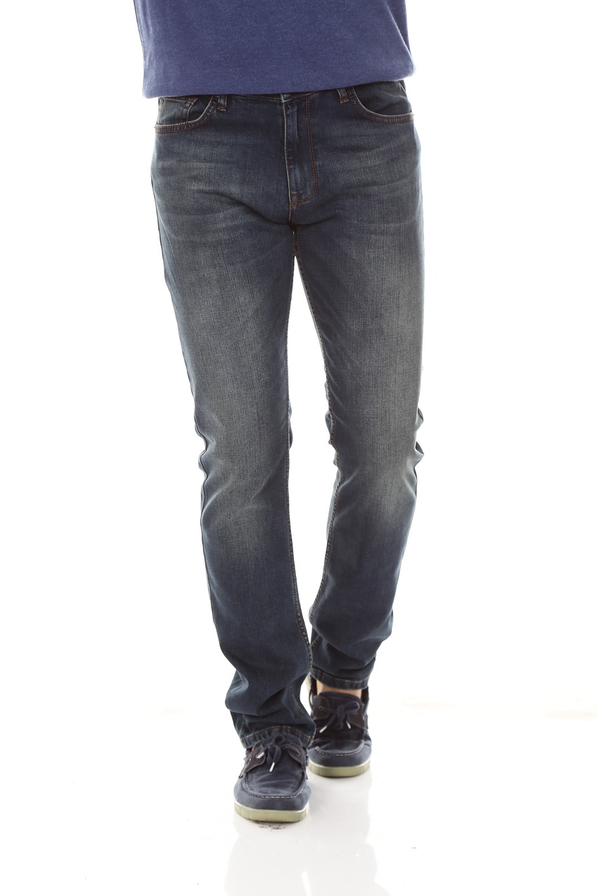 a man standing with his hands in his pockets, by Rodney Joseph Burn, shutterstock, tight denim jeans, (mist), bangalore, full - body - front - shot