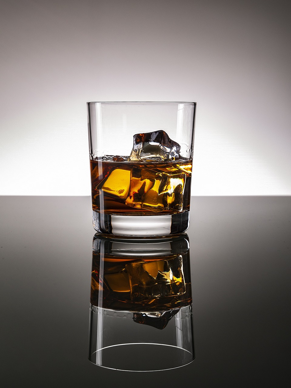 a glass of whiskey sitting on top of a table, by Jan Rustem, photorealism, whiskey glass with ice cubes, product photo, high res photo, full length shot