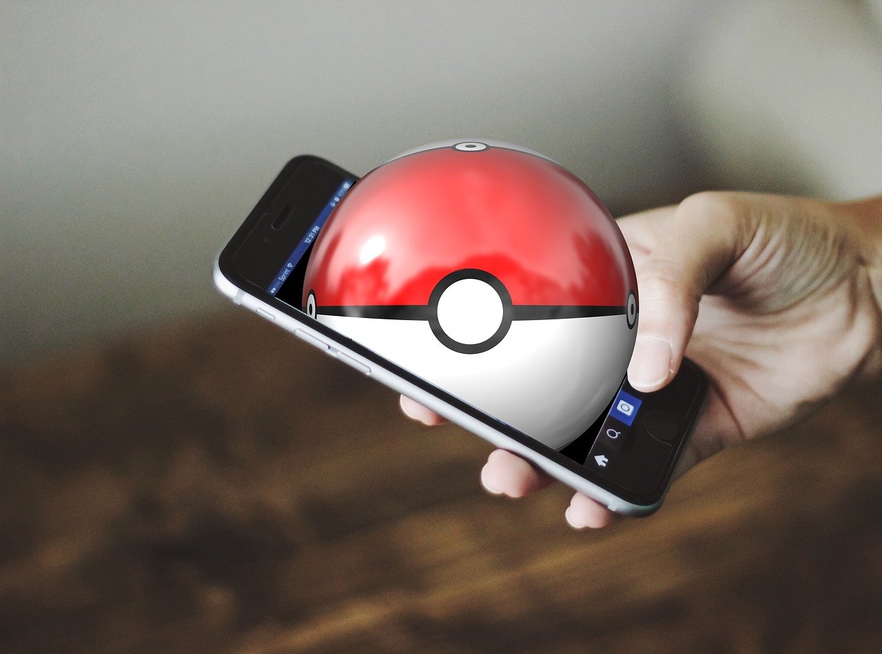 a close up of a person holding a cell phone, a digital rendering, by Joe Bowler, shutterstock, pokeball, realistic scene, listing image, pokemon inspired