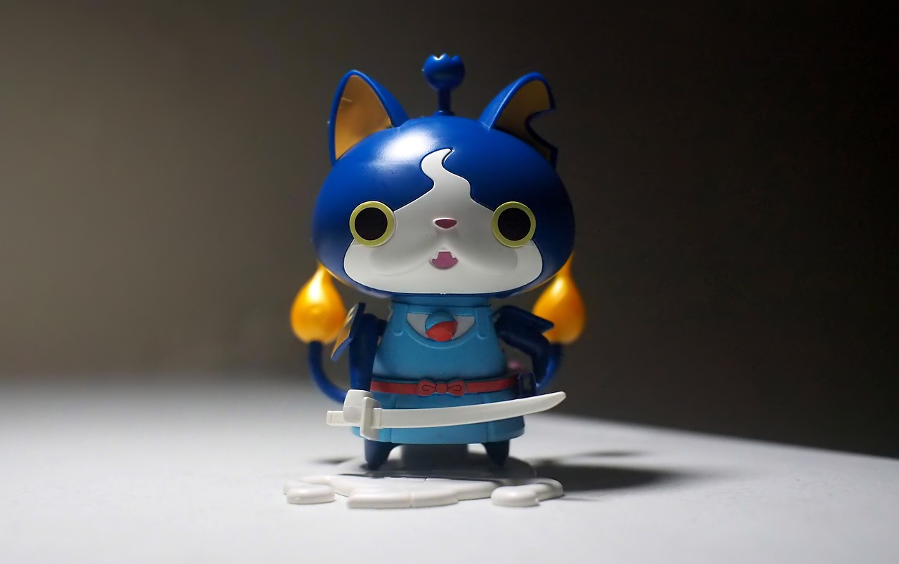 a close up of a toy cat on a table, by Miyamoto, flickr, kill la kill, blue color, samurai pizza cats, anime character; full body art