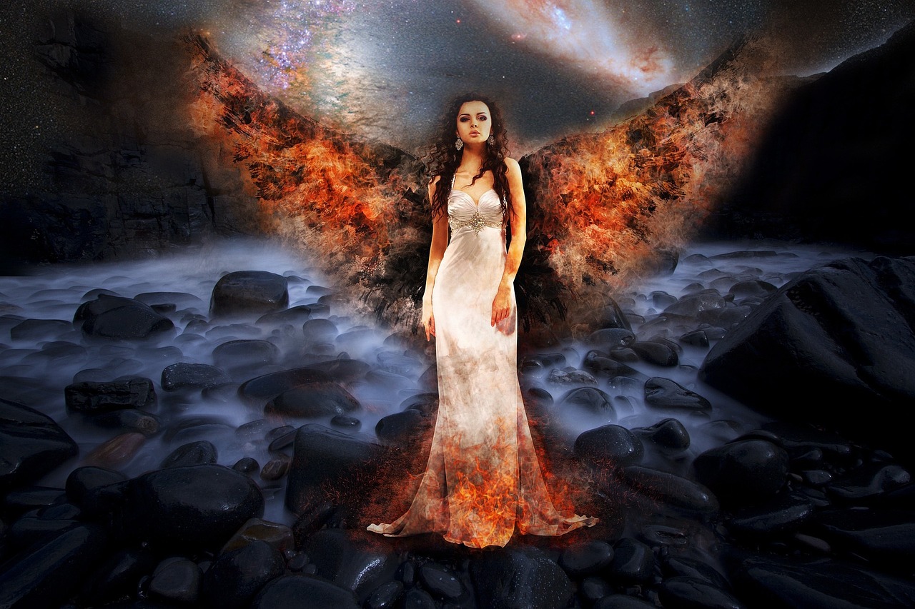 a woman in a white dress standing on rocks, digital art, fantasy art, fiery wings, photo - manipulation, portrait of a cosmic goddess, 2 angels
