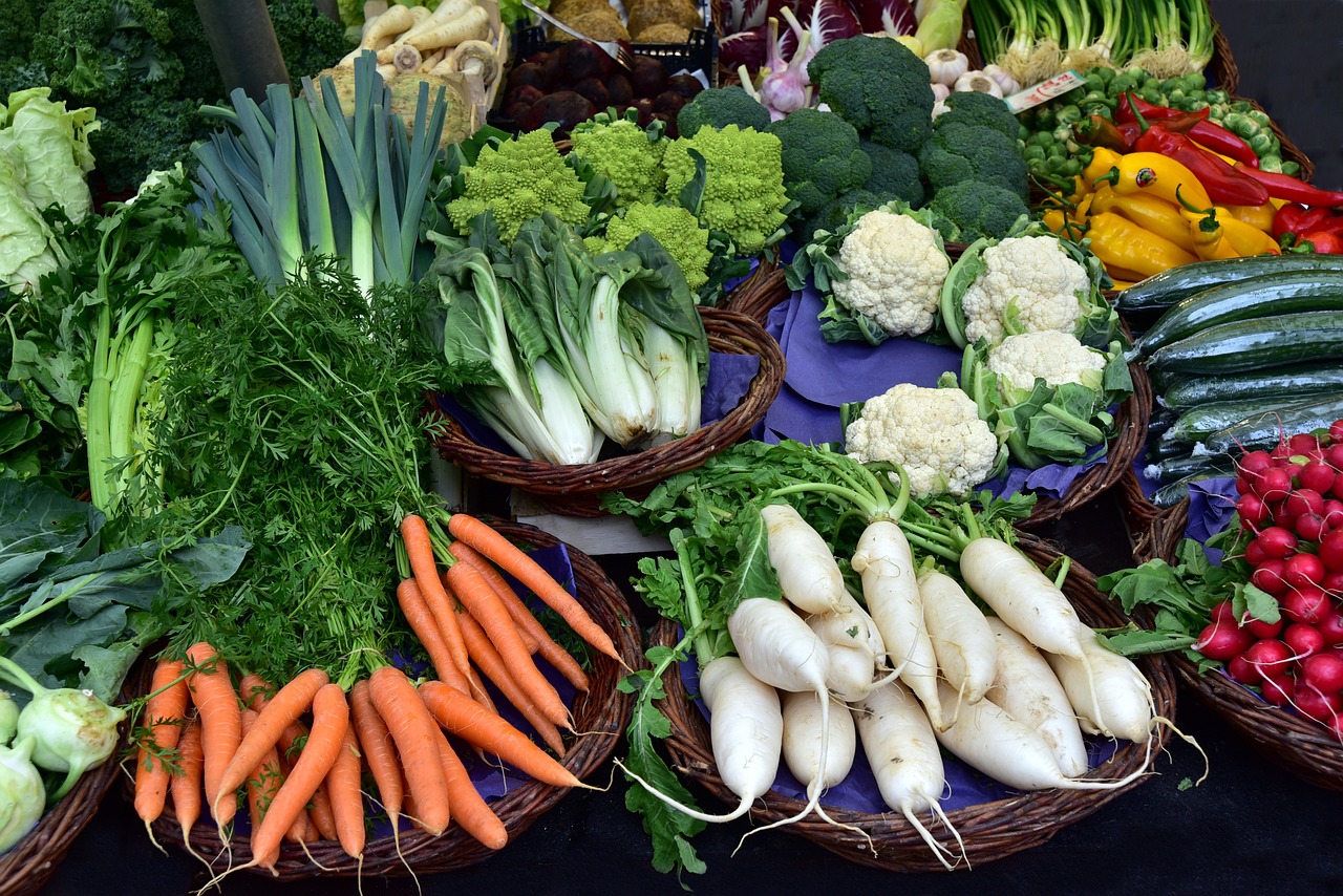 a table topped with lots of different types of vegetables, a picture, by John Murdoch, carrots, whites, closeup photo, market in ancient rome