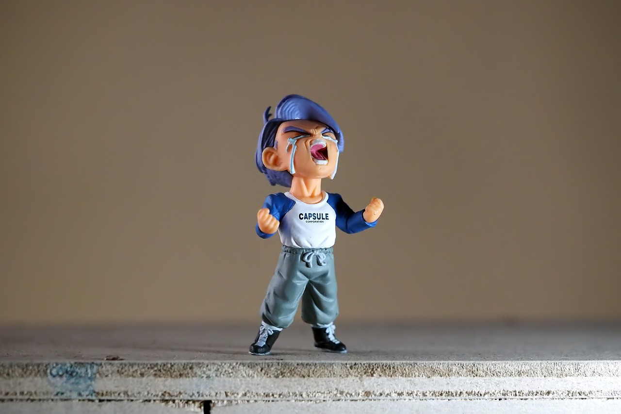 a close up of a figurine of a baseball player, a picture, inspired by Yue Minjun, pexels, figuration libre, prince vegeta, full body sarcastic pose, little kid, 3 4 5 3 1