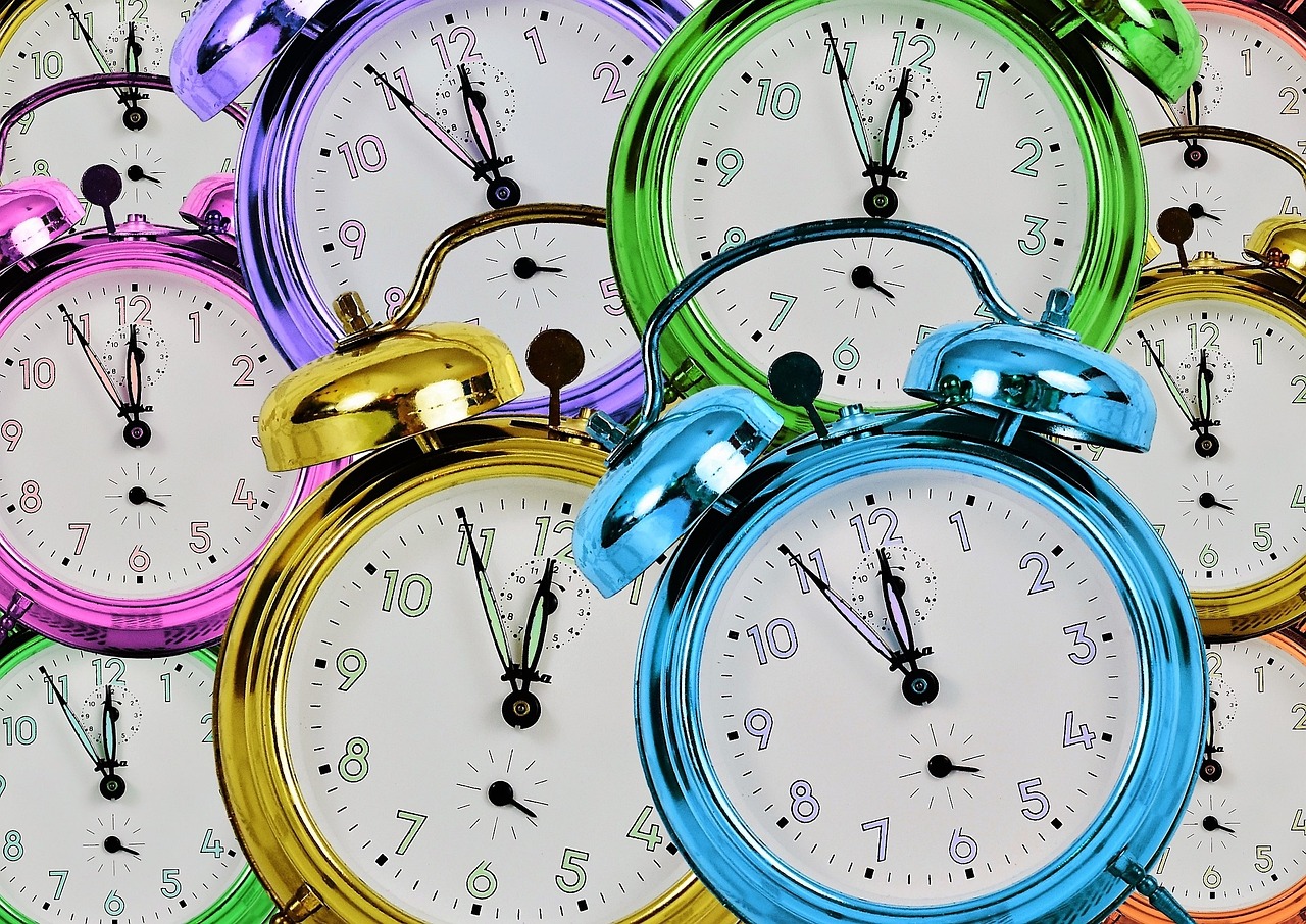 a bunch of clocks sitting next to each other, a digital rendering, pixabay, full of colour 8-w 1024, alarm clock, colourful close up shot, purple and blue and green colors