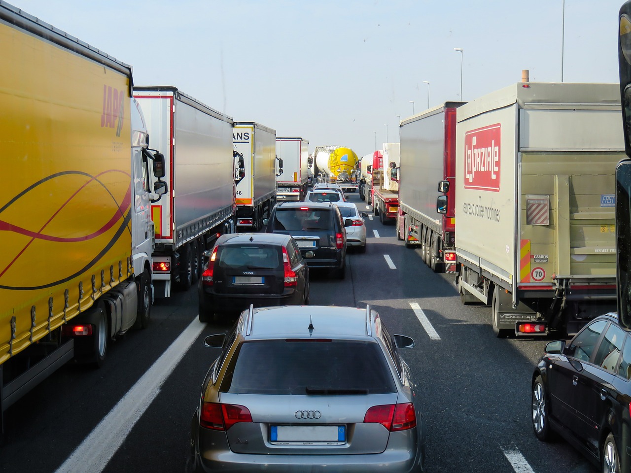 a busy highway filled with lots of traffic, a picture, by Oskar Lüthy, shutterstock, figuration libre, northern france, port, breakdown, inside a grand