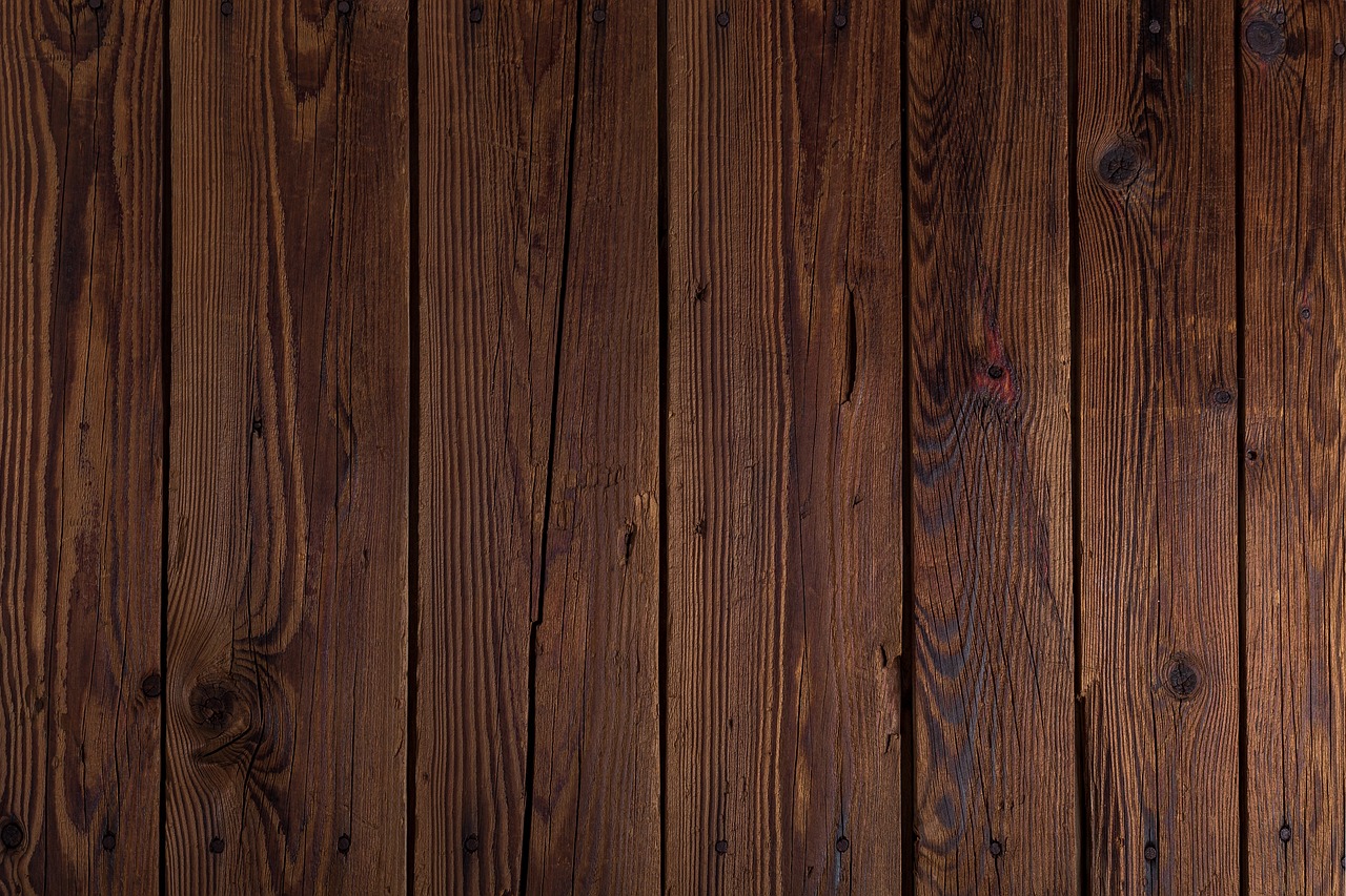 a fire hydrant sitting on top of a wooden floor, a stock photo, trending on pixabay, minimalism, wooden walls brass panels, black fine lines on warm brown, vertical wallpaper, on clear background