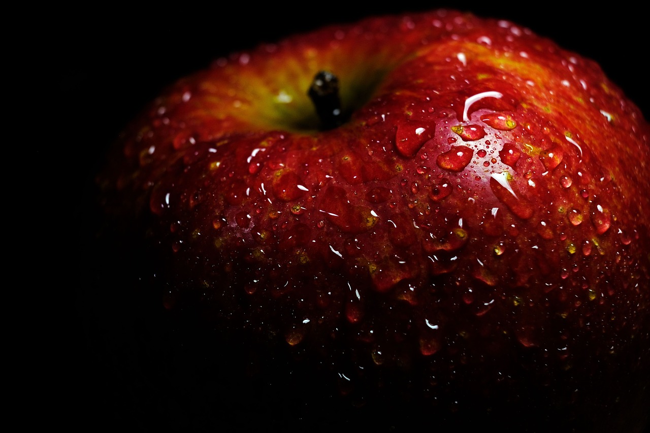 a red apple with water droplets on it, a macro photograph, by Tom Carapic, 1k hd, high detail 4 k, closeup at the food, mac