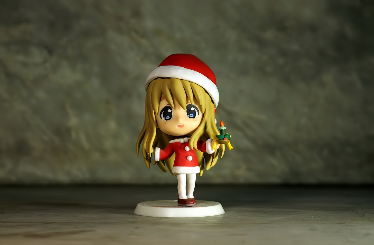 a close up of a figurine of a girl wearing a santa hat, a picture, inspired by Satake Yoshiatsu, sougo okita, pvc figurine, hermione, miniature product photo