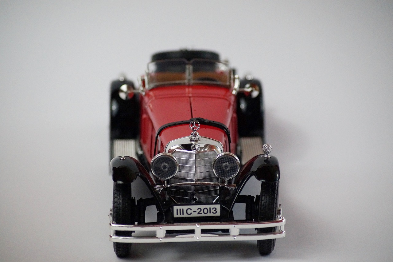 a close up of a toy car on a white surface, a picture, by Jürg Kreienbühl, pixabay, photorealism, mercedez benz, 1 9 3 1, detailed model, convertable