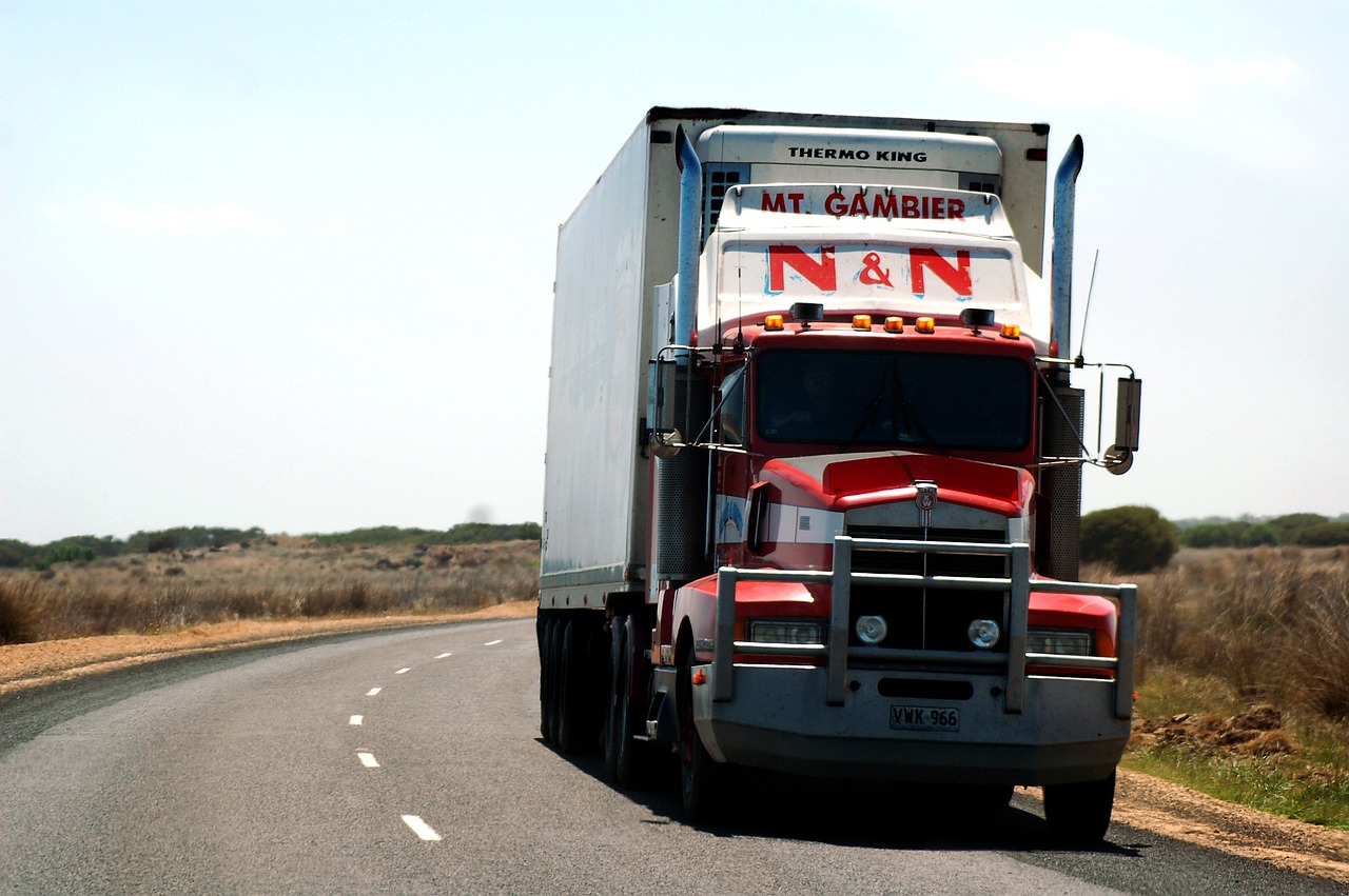 a semi truck driving down a country road, flickr, random detail, p. j. n, twins, tarantino